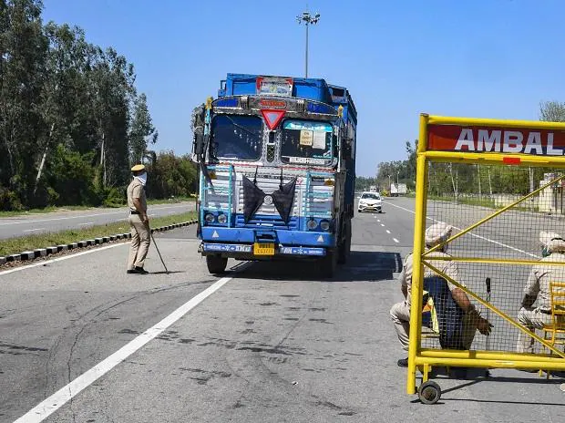 coronavirus, police, barricade, trucks, highway, roads, transport, roadblock